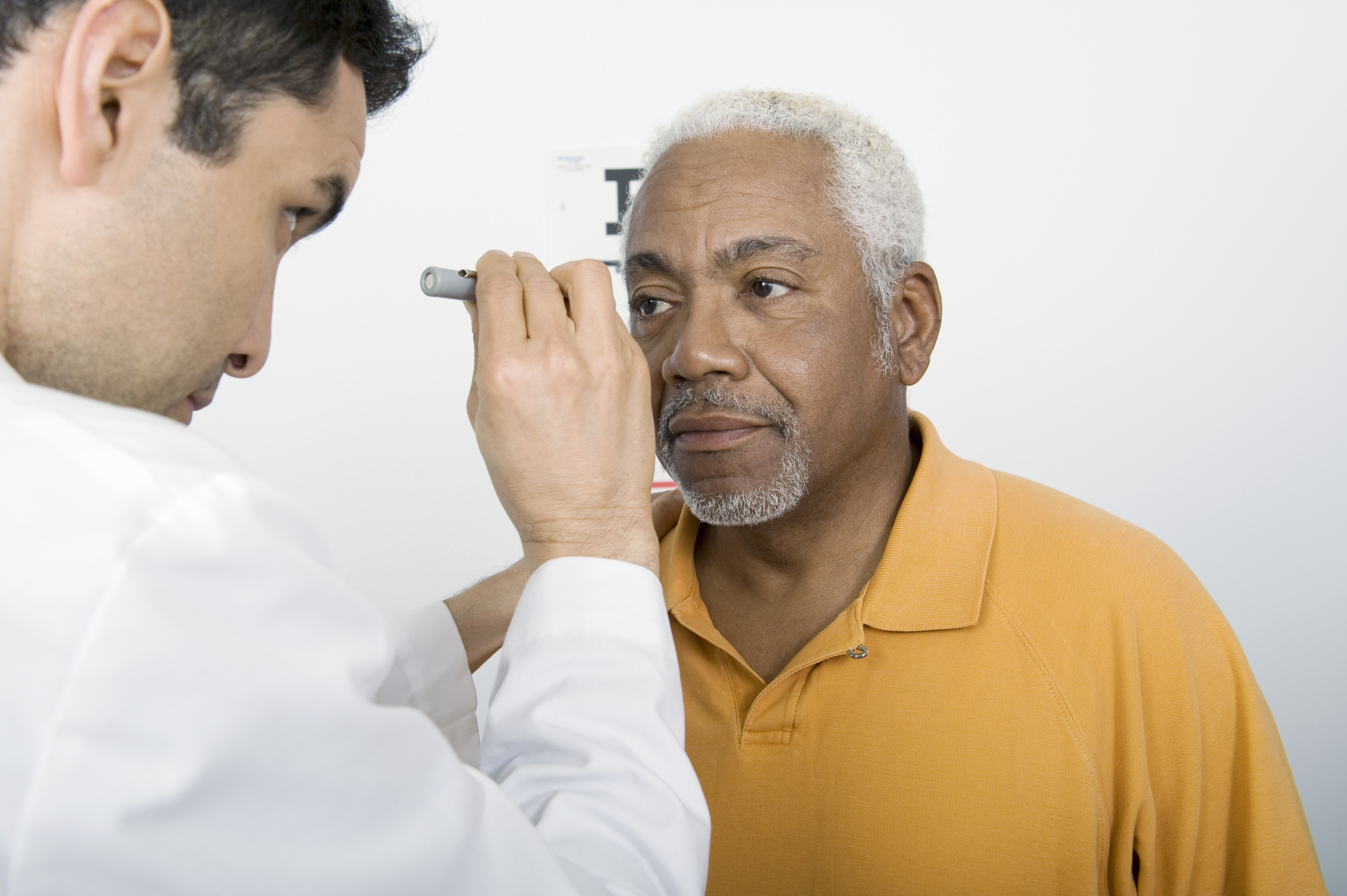Older African American man having his eyes checked